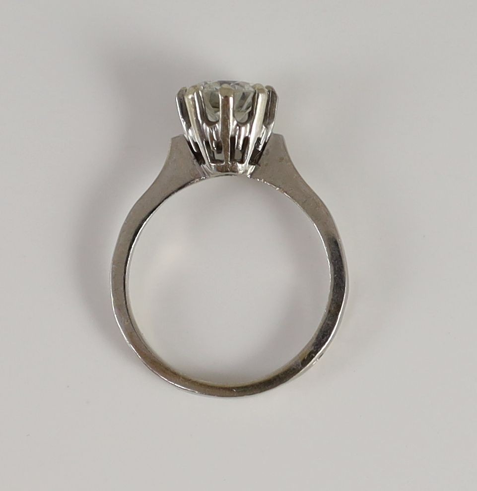 A white gold and solitaire diamond ring